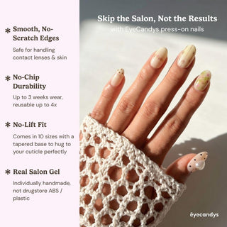 A hand with long, oval-shaped Little Bea Press-On Nails by EyeCandys—featuring nude, floral, and heart designs—rests on white crochet fabric. Text highlights smooth edges, durability, and real salon gel quality.