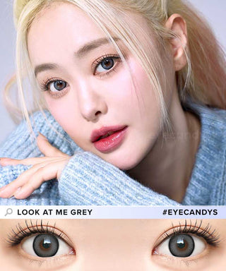 A model wearing Dekame ook At Me Grey contact lenses and peach lipstick, accompanied by minimal makeup. Below is a close up eye image of the model wearing the same lens.