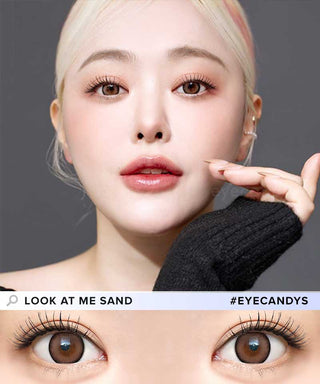 A model wearing Dekame ook At Me Sand contact lenses and peach lipstick, accompanied by minimal makeup. Below is a close up eye image of the model wearing the same lens.