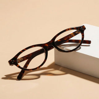 Loretta Oval prescription reading glasses by Eyecandys, full frame design, blue light blocking lenses, perfect for Diamond and Heart face shapes.