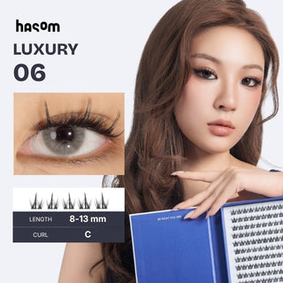Hasom Luxury 06 false eyelash set shown with a model holding an open tray of lashes, an inset close-up of a gray eye wearing the lashes, and text specifying length 8-13 mm and curl C.
