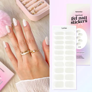 Hand wearing EyeCandys Lychee Gel Nail Sticker – soft white-nude nails for a natural, polished look. Elegant, understated DIY gel manicure perfect for everyday wear or special occasions. Vegan, non-toxic, and long-lasting salon-quality gel nails.