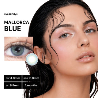 Close-up portrait of model wearing EyeCandys Pink Label Mallorca Blue contact lenses with muted blue-green tone and natural enhancement