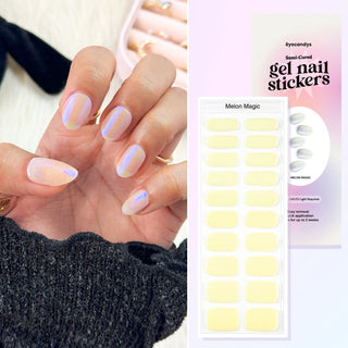 Hand with EyeCandys Melon Magic Gel nail stickers applied, featuring a stunning white chrome color. Perfect for bold, metallic manicures, offering long-lasting wear, easy application, and a high-shine, salon-quality gel finish for dazzling nails