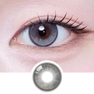 Close-up of eye with long lashes wearing EyeCandys Olola Meow Scottish Grey prescription colored contact lens, with lens design shown below.