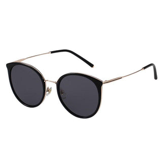 side view of Monaco Round Sunglasses in Black Gold. cat-eye vintage eyeglass frame, available in blue light blocking lenses and readers, photographed on a white background, from EyeCandys