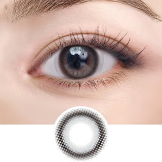 Close-up of eye with long lashes wearing EyeCandys NEOism Pure Mud Black prescription colored contact lens - detailed pixelated lens design shown below, deep natural black color, comfortable daily wear, trending cosmetic lenses