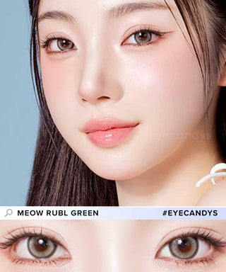 A female model with natural dark eyes wearing Olala Meow Rubl Green contact lenses, complemented by subtle eyeshadow and peach lip gloss and Close-up image showcases the model's eyes adorned with the same Green contact lenses
