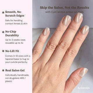 Hand wearing EyeCandys Moon Syrup press on nails with natural nude tone and soft pearly cat-eye reflection.