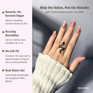 Hand wearing EyeCandys Cloud Nine press on nails with luminous milky white tones and multidimensional cat-eye shimmer.