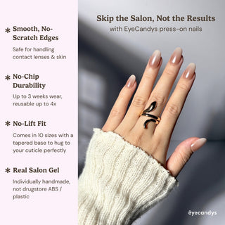 Hand wearing EyeCandys Cloud Nine press on nails with luminous milky white tones and multidimensional cat-eye shimmer.