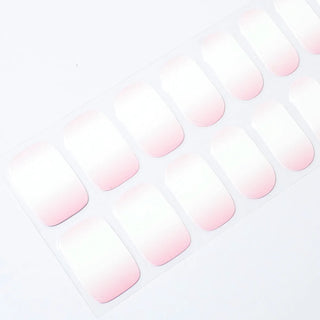 Angled image of semi-cured gel nail stickers in the design 'Pink Candy,' featuring a soft pink gradient with a glossy finish for a delicate and sweet manicure look.