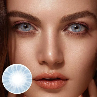 Portrait of a woman wearing Shade Blue contact lenses on medium brown eyes