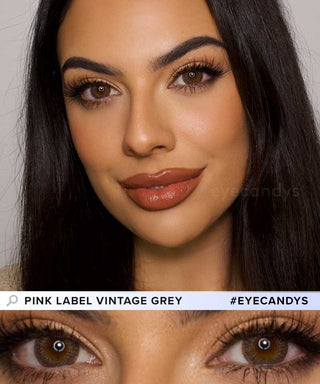 A female model with natural dark eyes wearing Pink Label Vintage grey contact lenses, complemented by subtle eyeshadow and peach lip gloss and Close-up image showcases the model's eyes adorned with the same grey contact lenses