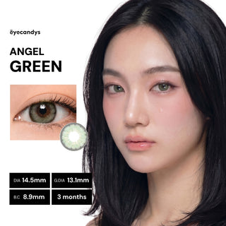 Close-up of a woman with straight black hair wearing EyeCandys Pink Label Angel Green contact lens in her right eye. Enlarged view shows lens size, base curve, and duration—perfect colored contacts for dark eyes. Text: "ANGEL GREEN.