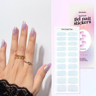 Hand featuring EyeCandys Pink Soda gel nail stickers, with a film displaying the design. Ideal for effortless, trendy nail art with durable, vibrant patterns and a professional finish for at-home manicures