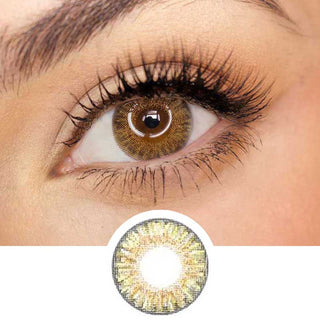 Pink Label Fresh Look Pure Hazel color contact lens on top of a dark eye paired with subtle eye makeup and curled wispy eyelashes, above the contact lens design.