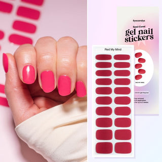 Hand with EyeCandys Red My Mink Gel nail stickers applied, showcasing a bold red color. Ideal for classic, vibrant manicures, offering long-lasting wear, easy application, and a high-shine, salon-quality gel finish for stunning, polished nails.