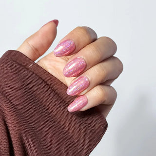 Hands Wearing EyeCandys Supernova Gel Nail Stickers – Pink Glitter Nail Wraps for Easy, Long-Lasting, Salon-Quality Manicure