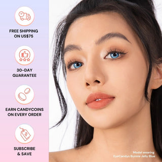 Full face of model wearing EyeCandys Bunnie Jelly Blue colored contact lenses. Close-up highlighting translucent aqua iris, luminous glow, long lashes, and soft limbal ring for a fresh, modern eye look.