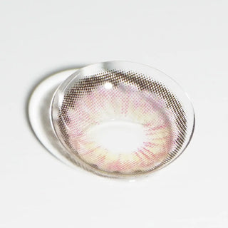 EyeCandys Angel Pink prescription contact lenses offer a soft, subtle pink hue designed to brighten the eyes. These lenses provide a natural yet captivating look, ideal for those seeking a delicate color change. Perfect for daily wear, they are available in various prescriptions, ensuring both style and comfort.