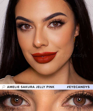 A female model with natural dark eyes wearing Eyecandys Amelie Sakura Jelly Pink contact lenses, complemented by subtle eyeshadow and redlipstick and Close-up image showcases the model's eyes adorned with the same pink contact lenses