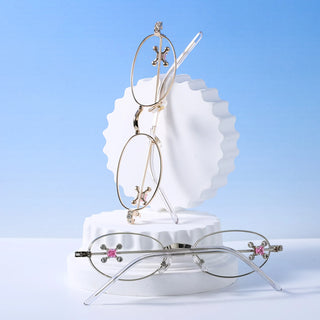 Rose gold Auden Oval Glasses by EyeCandys. Blue light blocking, transition-ready, perfect for wide faces. Compatible with prescription, Zeiss HMC, and polarized lenses