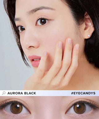 A fair-skinned woman touches her cheek while looking sideways. Below, a close-up highlights her brown eyes wearing Bausch & Lomb Lacelle Aurora Black (30pk) contact lenses from #EYECANDYS.