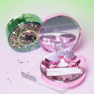 EyeCandys Magic Moon Contact Lens Case in vibrant pink and green colors. This stylish contact lens case features a unique moon design, perfect for safely storing and transporting your contact lenses. Ideal for fashion-forward individuals who prioritize eye care and want to keep their lenses secure in a chic case. Great for contact lens users seeking trendy accessories