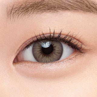 Close-up of model's eye wearing EyeCandys Define Fresh Latte prescription contact lens, enhancing eye color with a natural, fresh latte hue for clear vision and comfort.