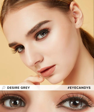 A close-up of a woman with flawless makeup features her realistic grey contacts from EyeCandys’ Promotion Desire Series. She gazes intensely, hand near chin. Another shot highlights her grey eyes. Text: "Desire Grey" and "#EYECANDYS".