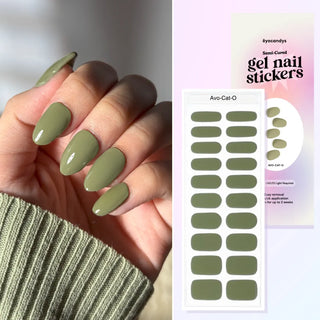 Hand wearing EyeCandys Avo-cat-o Gel Nail Sticker – creamy avocado green nails for a chic, playful DIY gel manicure. Modern, elegant, and effortless nail look perfect for everyday wear or subtle statement nails. Vegan, non-toxic, and long-lasting.