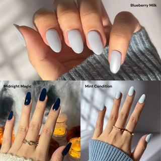 Hands wearing EyeCandys Blueberry Milk, Midnight Magic, and Mint Condition gel nail stickers, showcasing vibrant colors, glossy finish, and unique nail designs.