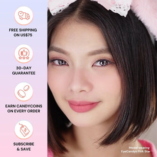 Model’s face wearing EyeCandys Pink Star contact lens – soft pastel pink star pattern enhances iris for a whimsical, doll-eyed sparkle with natural enlargement.