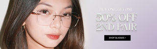 Close-up of model’s face wearing EyeCandys prescription reading glasses with blue light blocking lenses. Stylish design for clear vision and eye protection.