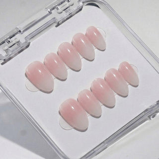 EyeCandys Glazed Donut press on nails featuring soft pink to milky white glazed ombre finish in a glossy clean girl nail aesthetic.