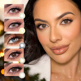 A woman with light skin, dark hair, and green eyes wears neutral makeup with glossy lips. Five close-up images of her eyes showcasing different colored contacts (light green, hazel, and blue, brown, grey) by EyeCandys are displayed next to her face. The background evokes festive lights. 