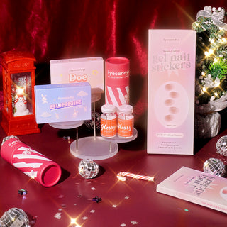 EyeCandys Christmas Holiday Bundle featuring gel nail stickers and Glossy, Bunnie, and Doe prescription colored contact lenses.