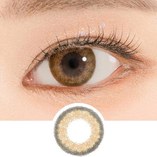 Close-up shot of a model's eye wearing Lensrang Stunning Brown color contacts with prescription, paired with K-beauty-inspired eye makeup, showing the brightening and enlarging effect of the circle contact lens on dark brown eyes, above a cutout of the contact lens pattern with limbal ring on a white background.