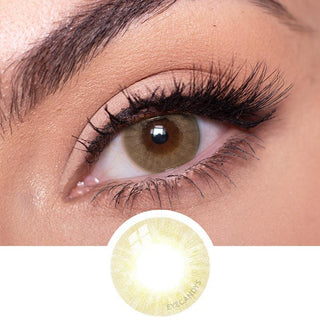 Closeup of the Libre Beige Color Contact Lens worn on a dark eye, with a thumbnail showing the color lens pattern.