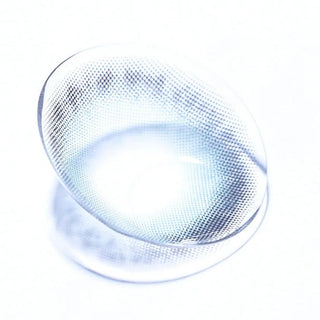 Macro shot of EyeCandys Olola Meow Koshort Green colored contact lens, showcasing intricate lens pattern and vibrant green color.