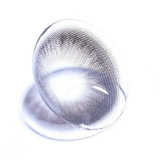 Macro shot of EyeCandys Olola Meow Scottish Grey colored contact lens, showcasing intricate lens pattern and subtle grey color.