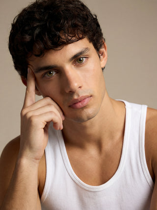 Male model showcasing EyeCandys Cashmere Satin Olive prescription colored contacts, natural look for everyday wear