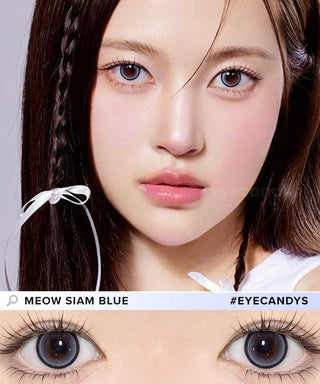 A female model with natural dark eyes wearing Olala Meow Siam Blue  contact lenses, complemented by subtle eyeshadow and peach lip gloss and Close-up image showcases the model's eyes adorned with the same blue contact lenses
