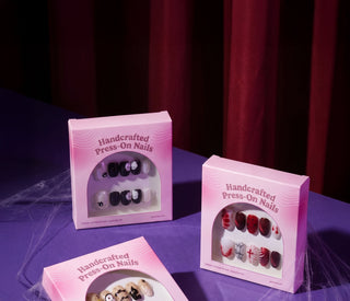 Halloween-themed EyeCandys Press-On Nails packaging showcasing a variety of cute spooky nail styles