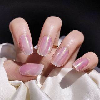 Model's hand showcasing EyeCandys Pink Soda Pop Gel Nail Stickers. These vibrant, pink-colored stickers offer a fun, chic look with a long-lasting, chip-free finish, perfect for effortless and stylish nail art.