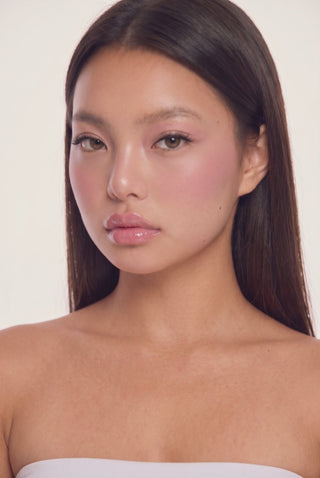 EyeCandys Natural 02 false lashes on a model, highlighting a natural lash style for minimal makeup and everyday wear.