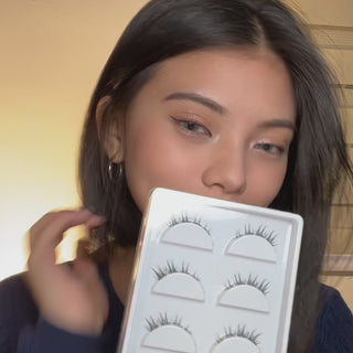 Application tutorial of EyeCandys Hasom First Touch Fancy 03 pre-glued strip lashes, featuring wispy, tapered fibers and a soft foxy lift at the outer corners for a lifted, defined eye look without separate lash glue.