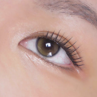  EyeCandys Amelie Biscuit Brown prescription colored contact lenses on a dark eyes