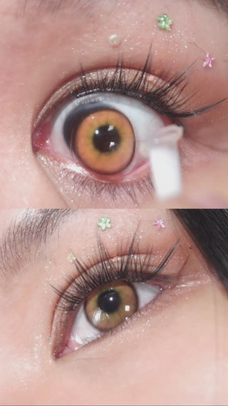 Video close-up of dark eye with long wispy lashes wearing Eyecandys PowerGlow Brown prescription colored contact lens for natural brown eye enhancement